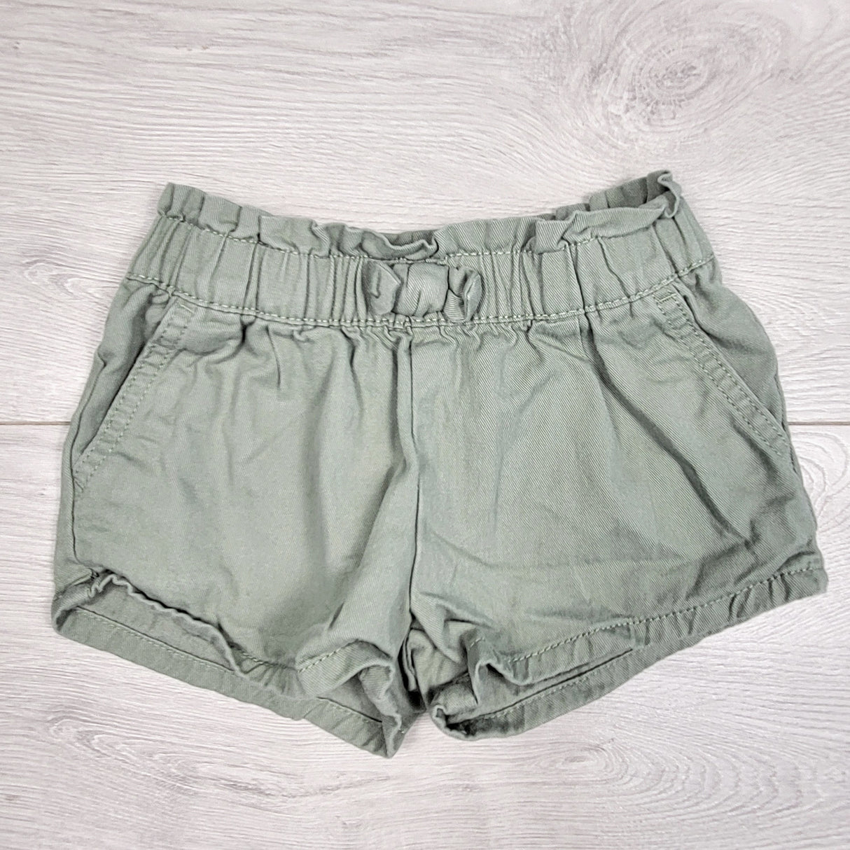 KIJA2 - Oshkosh green shorts with ruffle waist. Size 3T