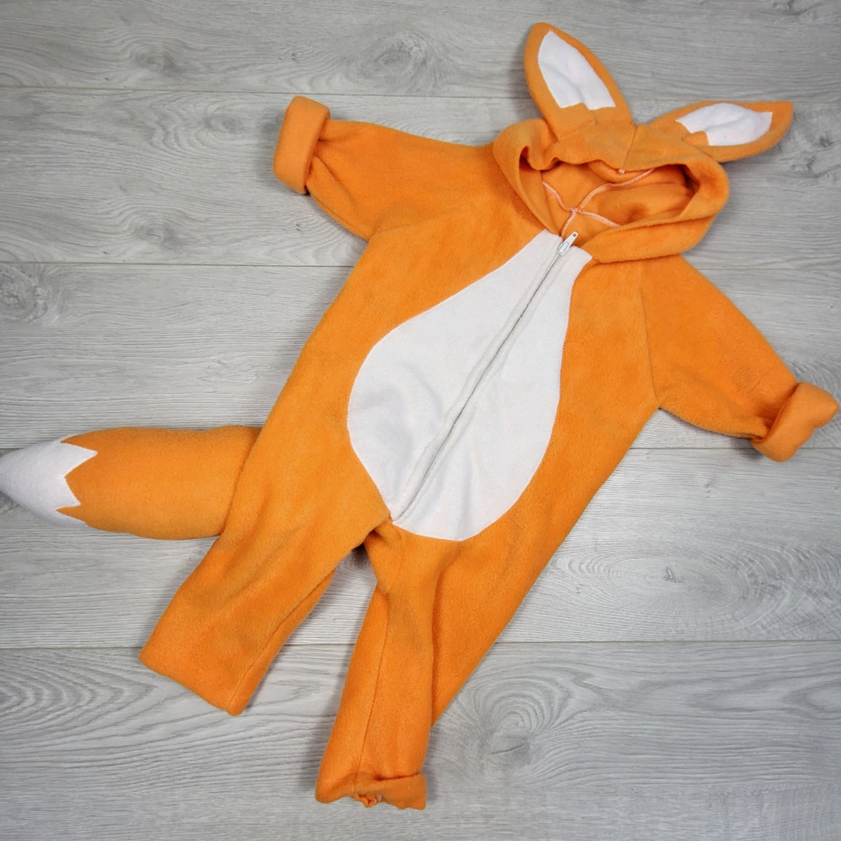 KDEL2 - Orange plush one piece fox costume. Approx 12 months
