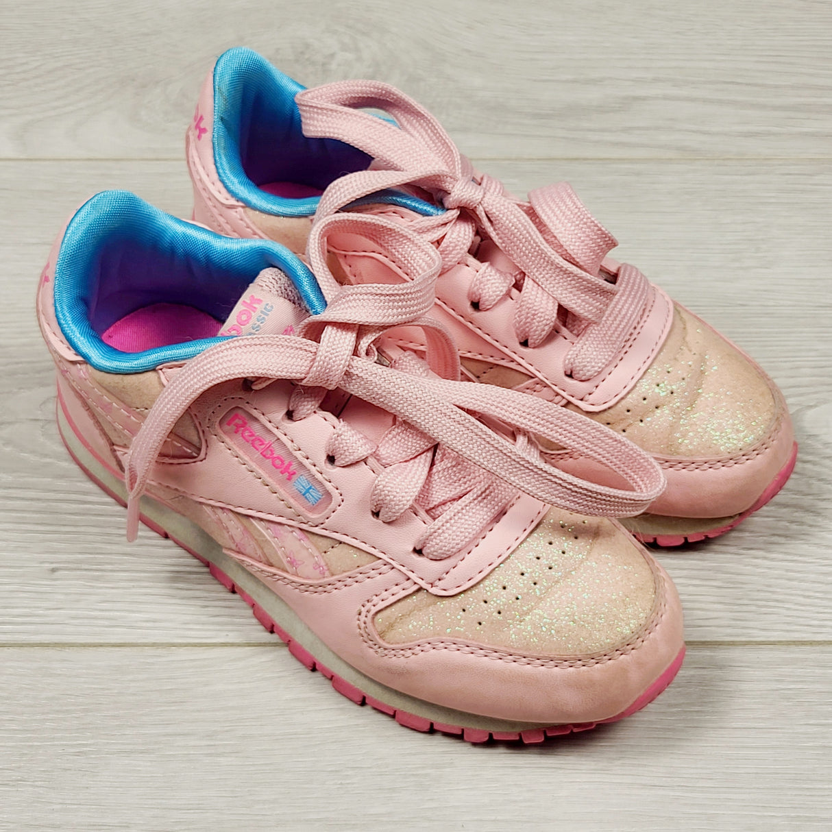 KIJA3 - Reebok light pink running shoes with sparkles. Size 10.5