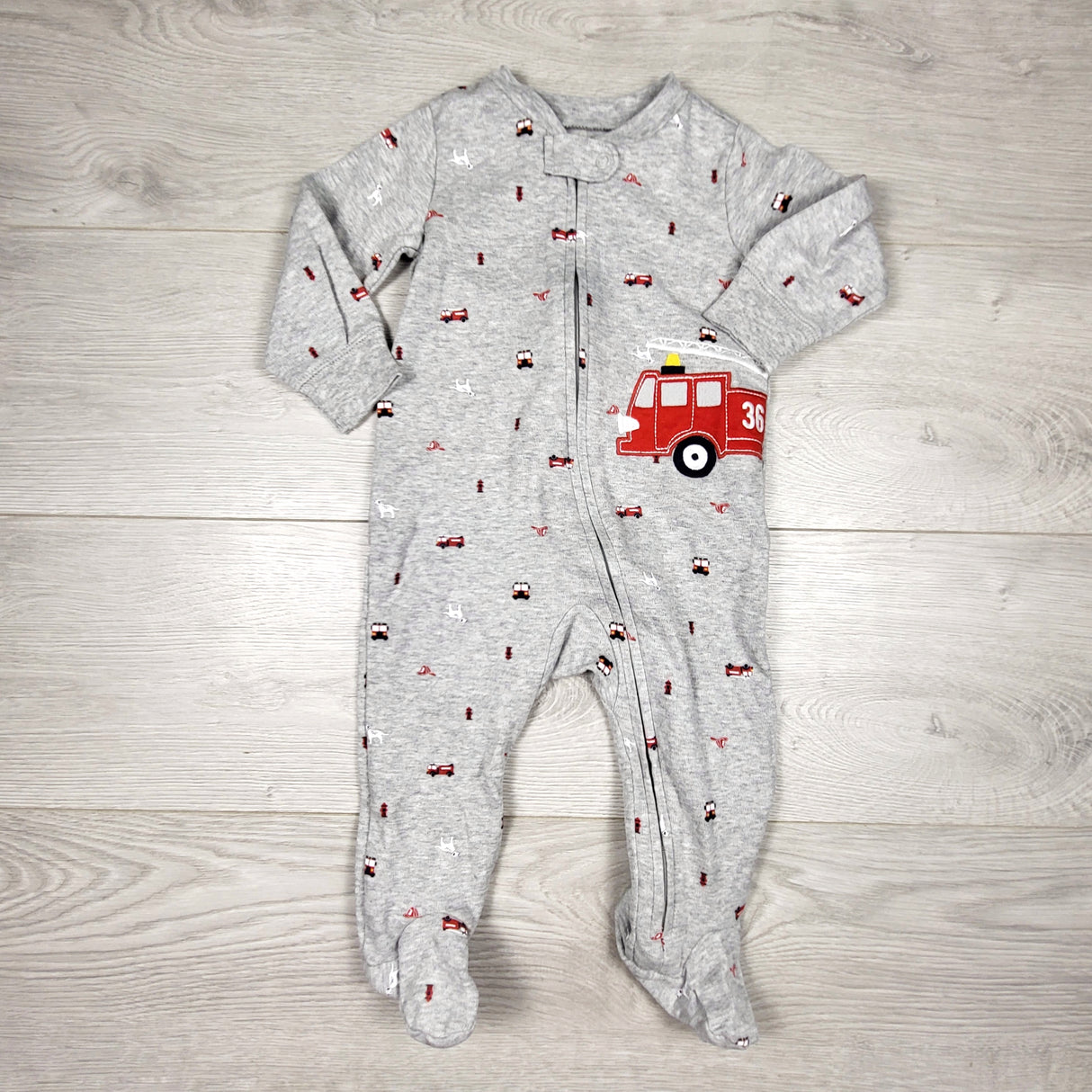 KAMG4 - Carters grey zippered cotton sleeper with fire trucks. Size 9 months