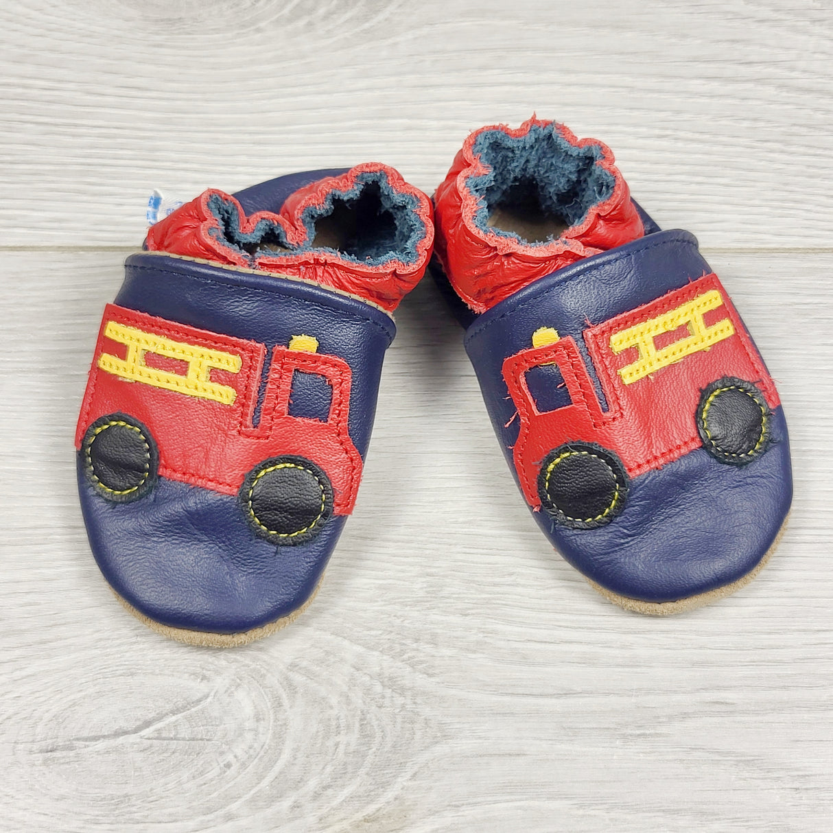 KAMG5 - Robeez leather soft soled shoes with fire trucks. Size 0-6 months