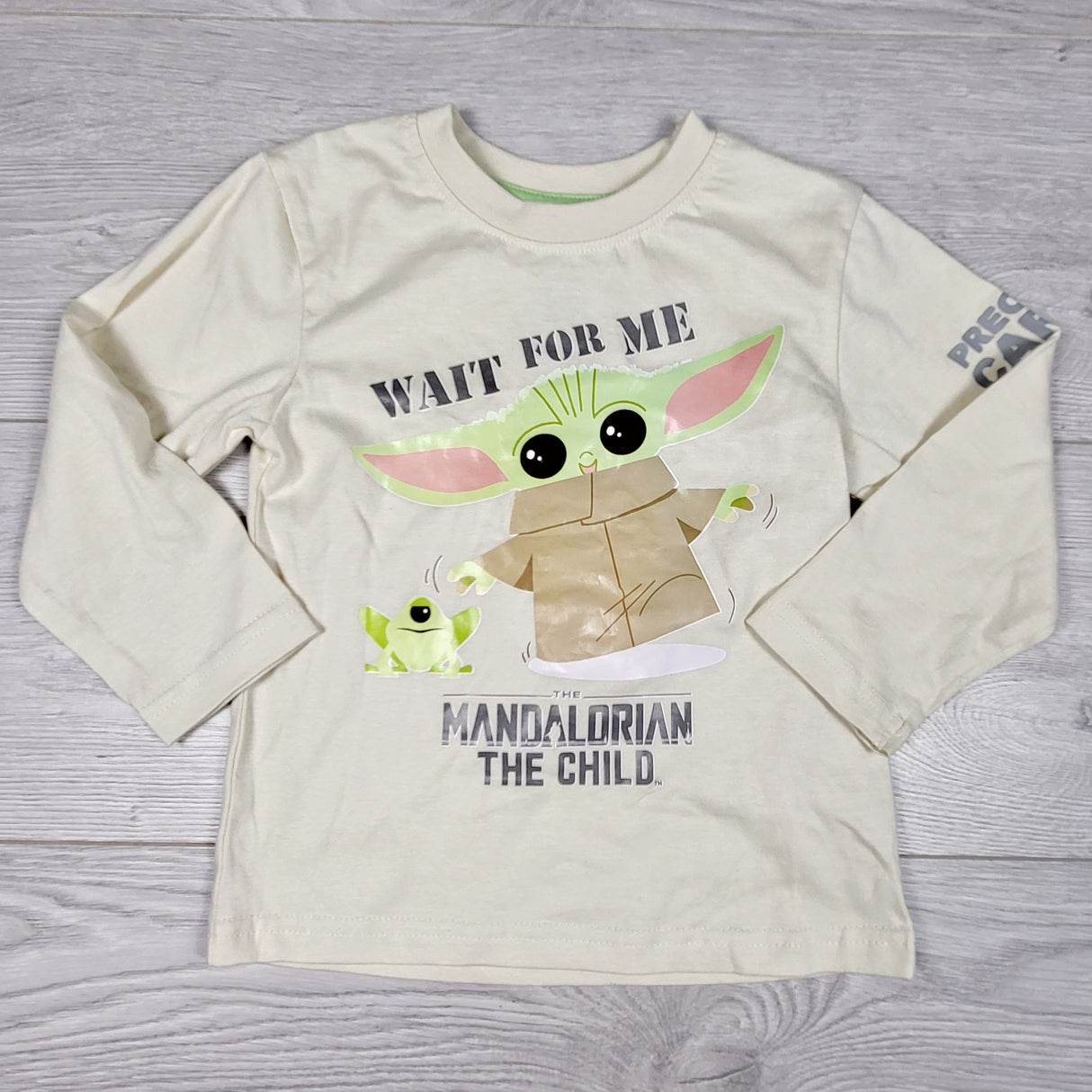 RZA1 - Cream coloured Star Wars Baby Yoda shirt. Size 3T