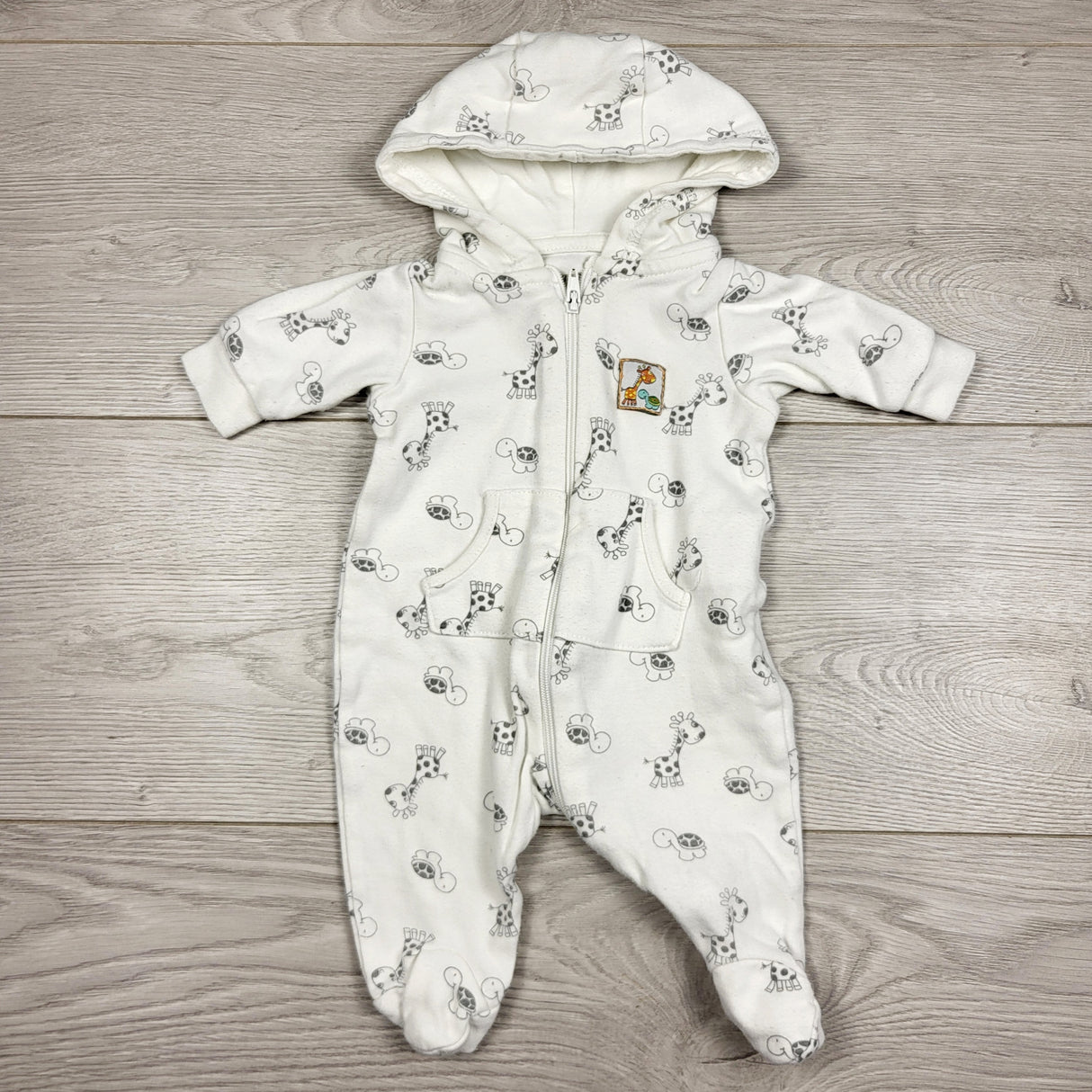 KARE11 - Snugabye white hooded romper with safari animals. Newborn size