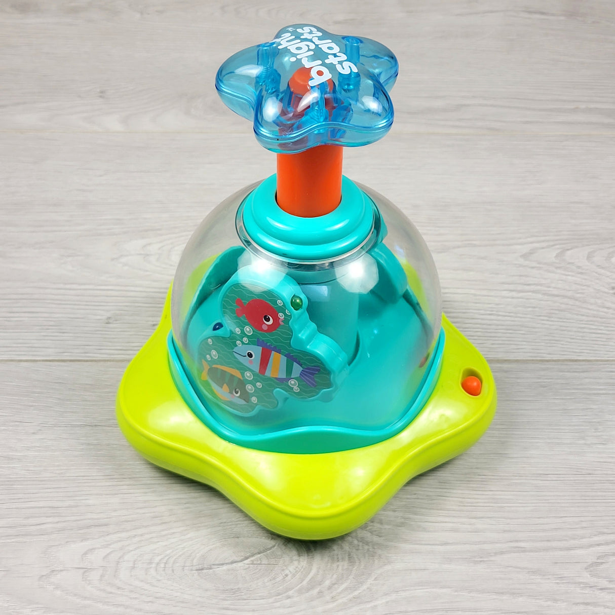 KHEN2 - Bright Stars Press and Glow spinner toy