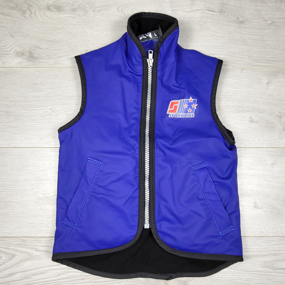 LMAC1 - NEW- Stormline 985 Wet Weather waterproof vest. Size 4-6 Years. Retails for $100 new