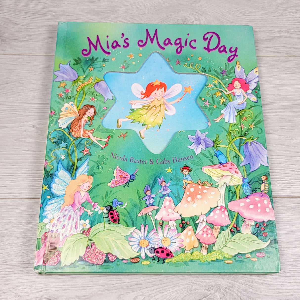 OAG22 - Mia's Magic Day. Hardcover glitter board book (large book)