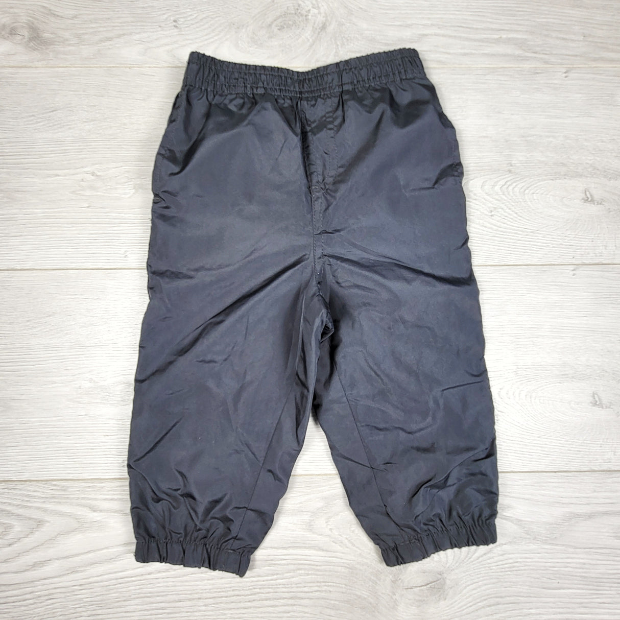 KDEL3 - George grey jersey lined nylon pants (not rain pants). Size 12-18 months
