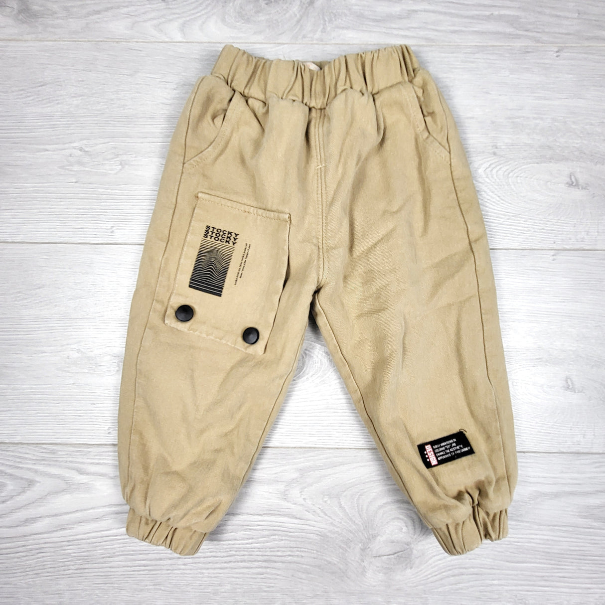 KDEL3 - Tan canvas fleece lined pants. Size 18-24 months