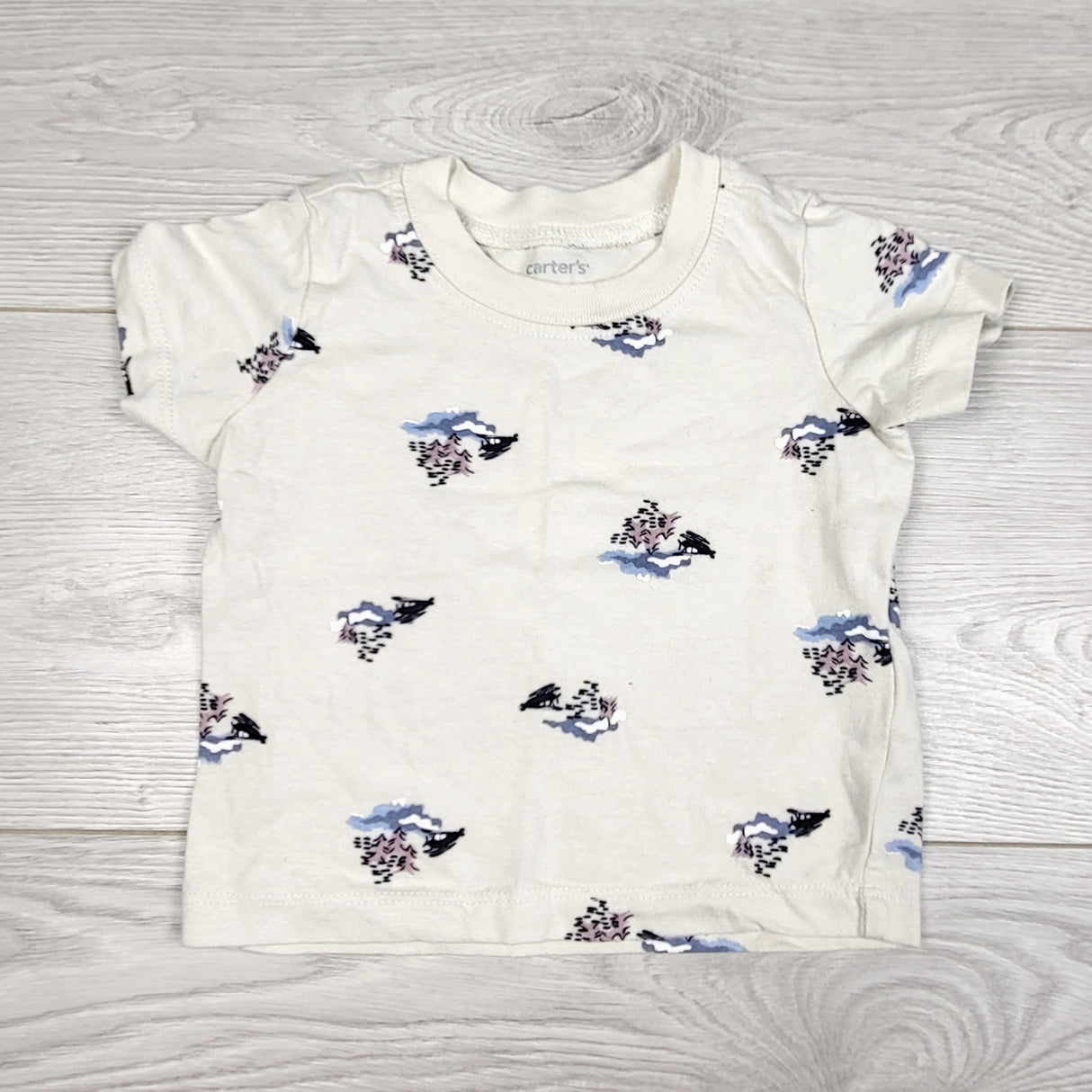 KDEL33 - Carters off white t-shirt with helicopters and trees. Size 6 months