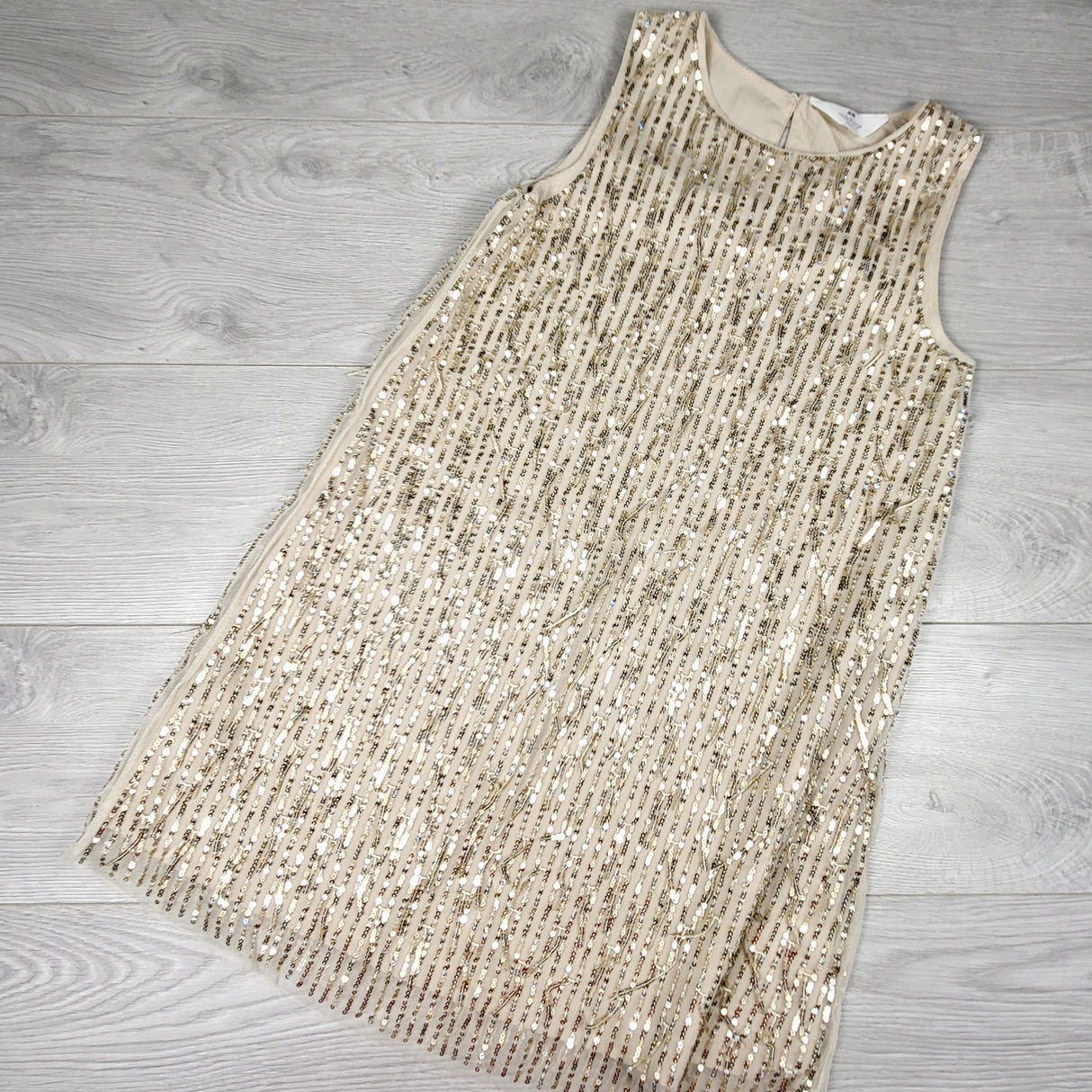 GFST1 - H and M gold sequin A-line dress with fringes. Size 9/10