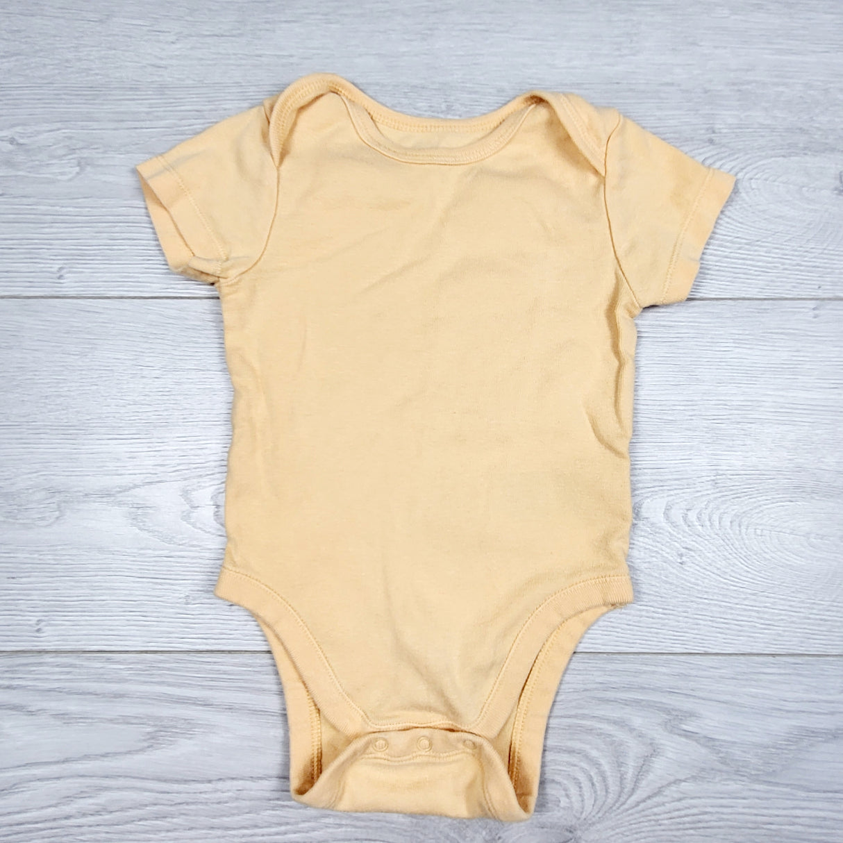 ORW1 - Old Navy peachy-orange bodysuit. Size 6-12 months