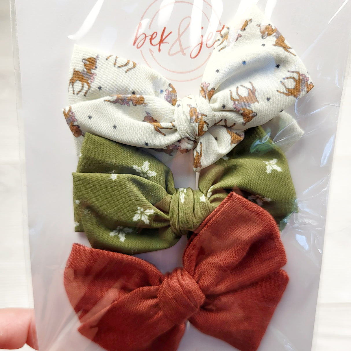 LHEP1 - NEW - Bek and Jet 3-pack Christmas-y bow clips
