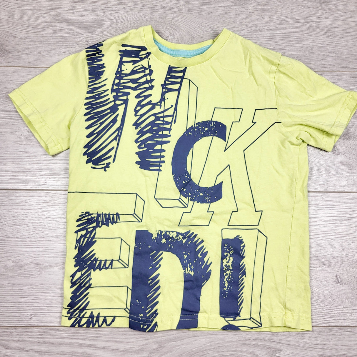 DJAS1 - George yellow "Wicked" t-shirt. Size 6