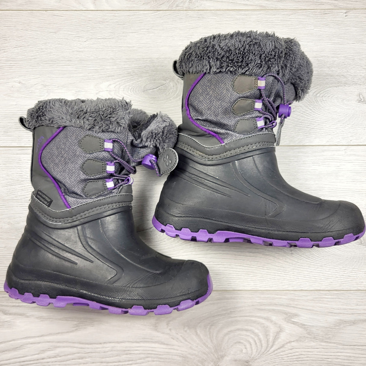 JKZ2 - XMTN grey and purple snow boots. Youth size 1