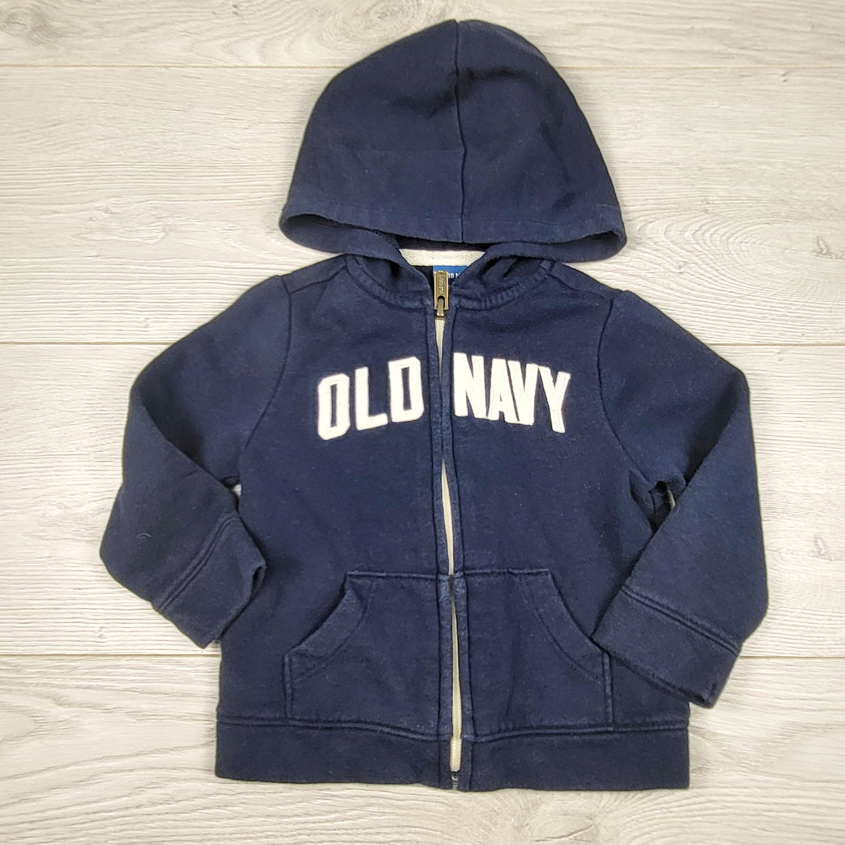 COWN1 - Old Navy navy fleecy lined zip up hoodie. Size 12-18 months