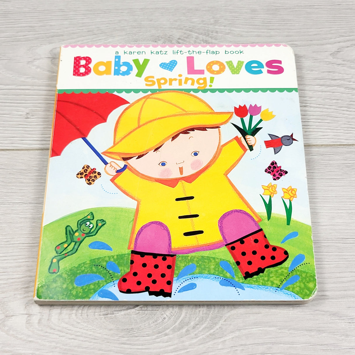 APPL1 - Baby Loves Spring. Lift the flap board book