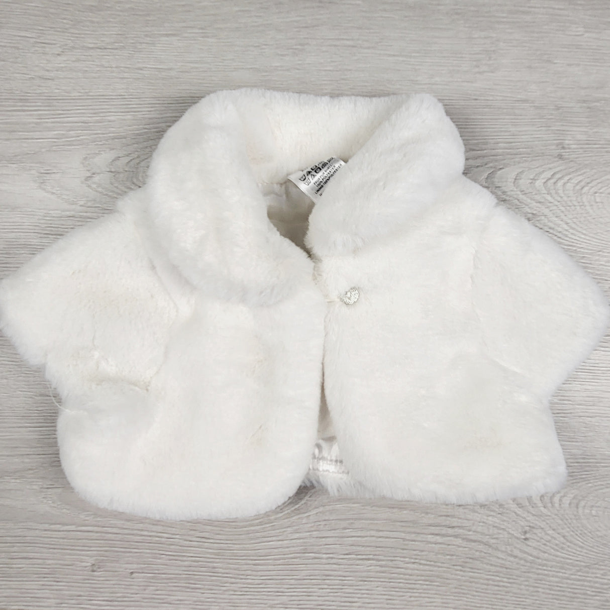 JEPR11 - White faux fur shrug. Size 3-6 months