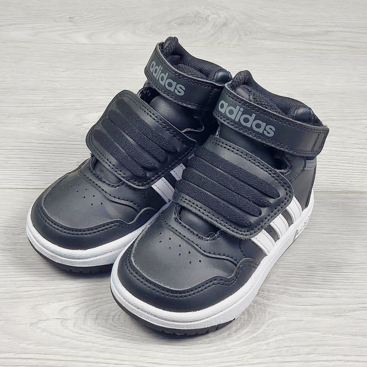 MCX1 - Adidas black "Hoops" hightop sneakers. Size 6