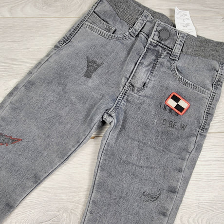 MCX1 - IKKS grey distressed pull on jeans with racing theme. Size 2T
