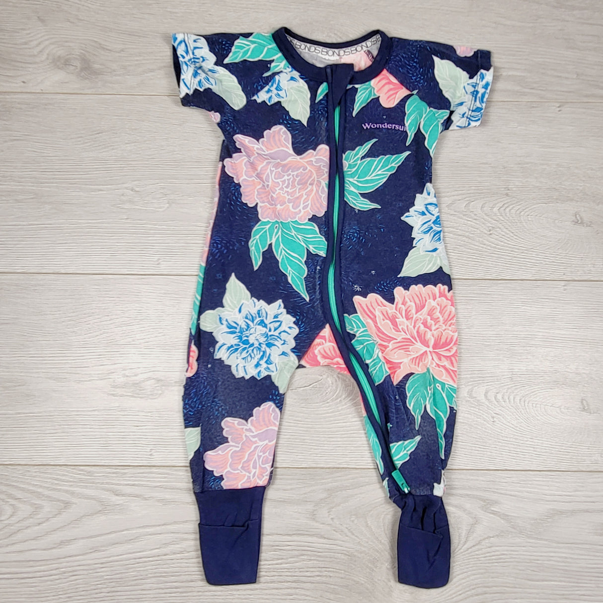 JEPR3 - Bonds navy floral print wondersuit. Size 3-6 months