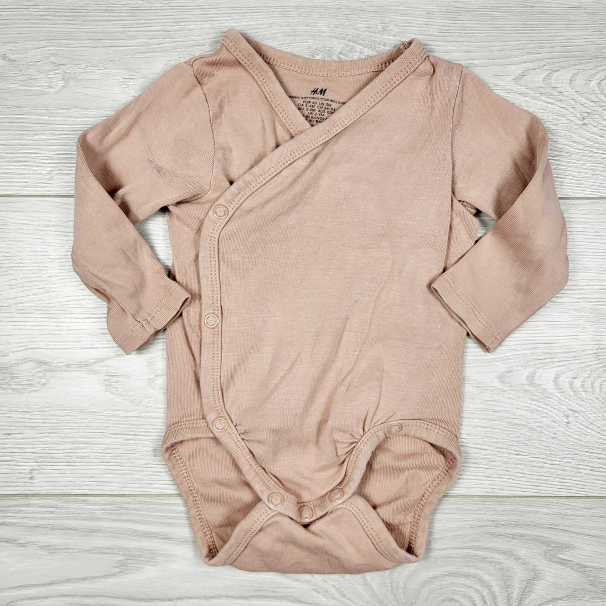 RBEN1 - H and M pinky-beige wrap style bodysuit. Size 2-4 months