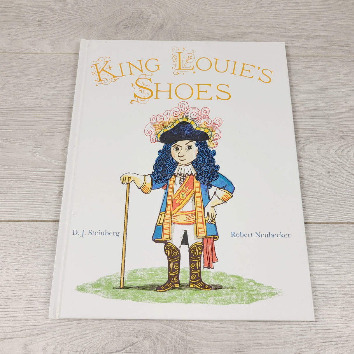 ESZ3 - King Louie's Shoes. Hardcover book