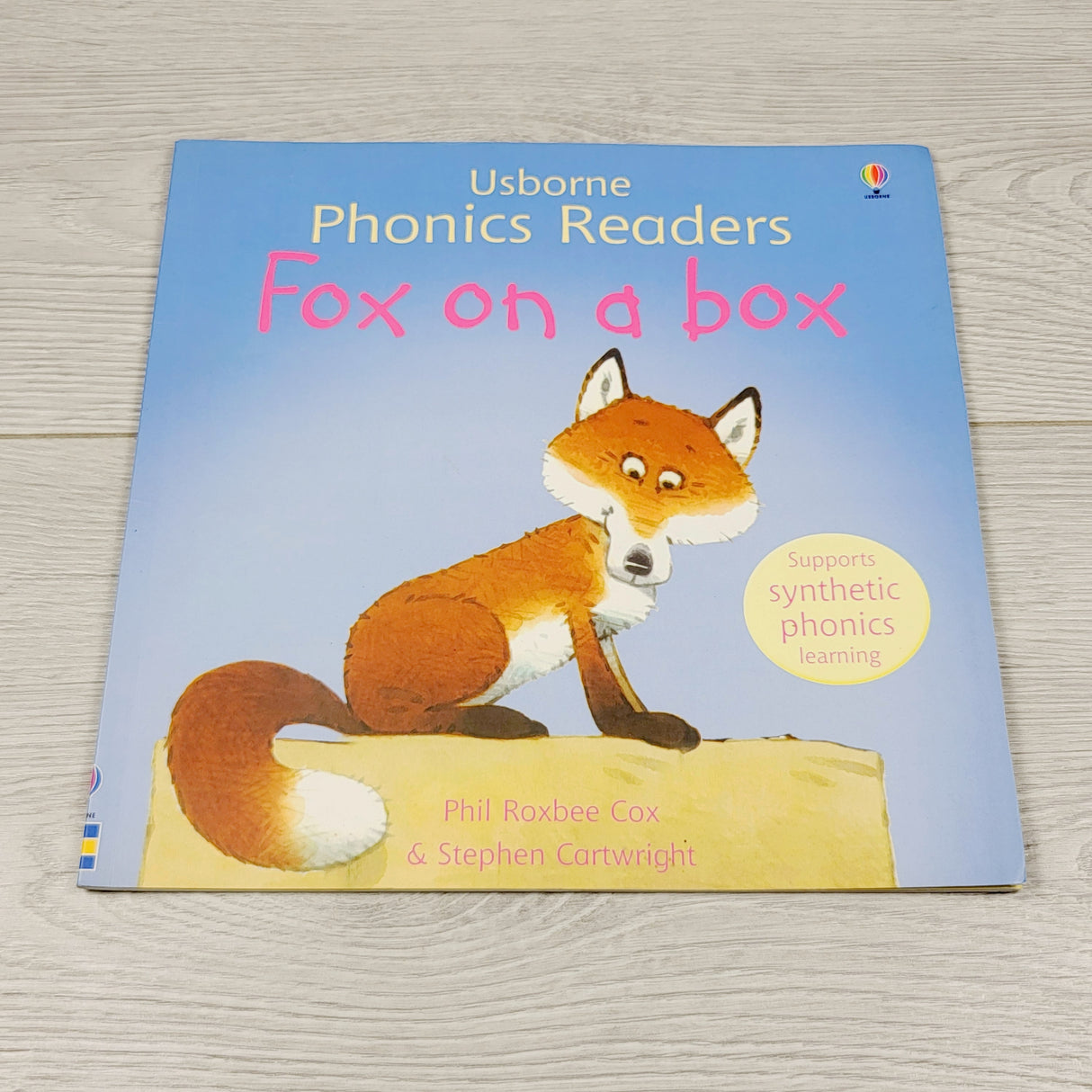 ESZ3 - Fox on a Box. Soft cover Usborne phonics book