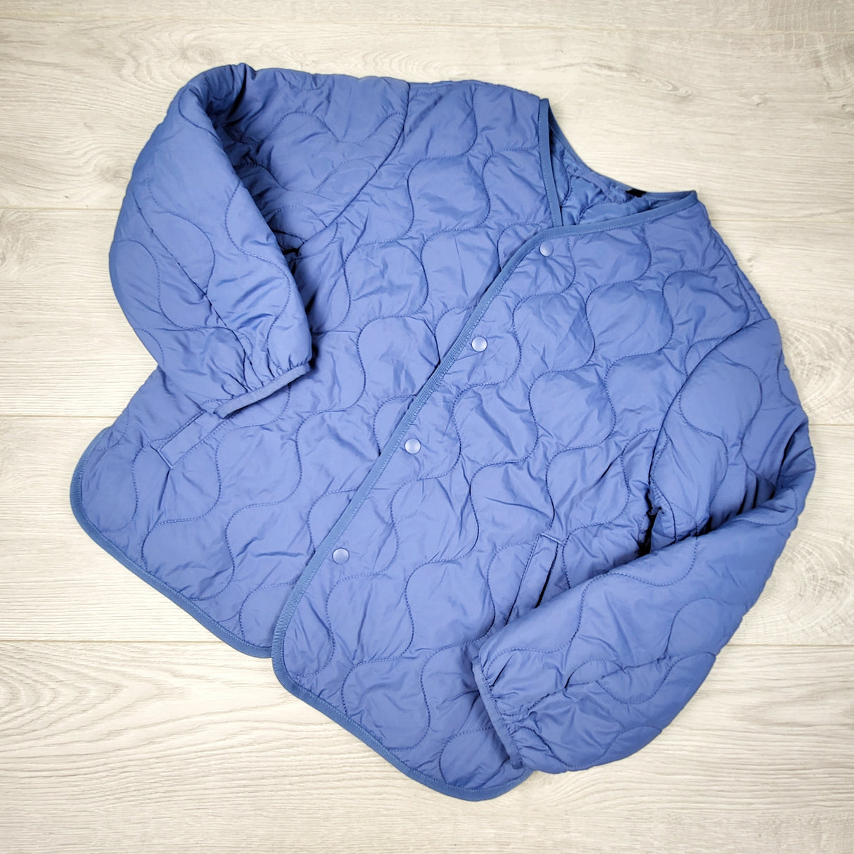 DZAV2 - Uniqlo blue quilted cotton jacket. Size 9/10