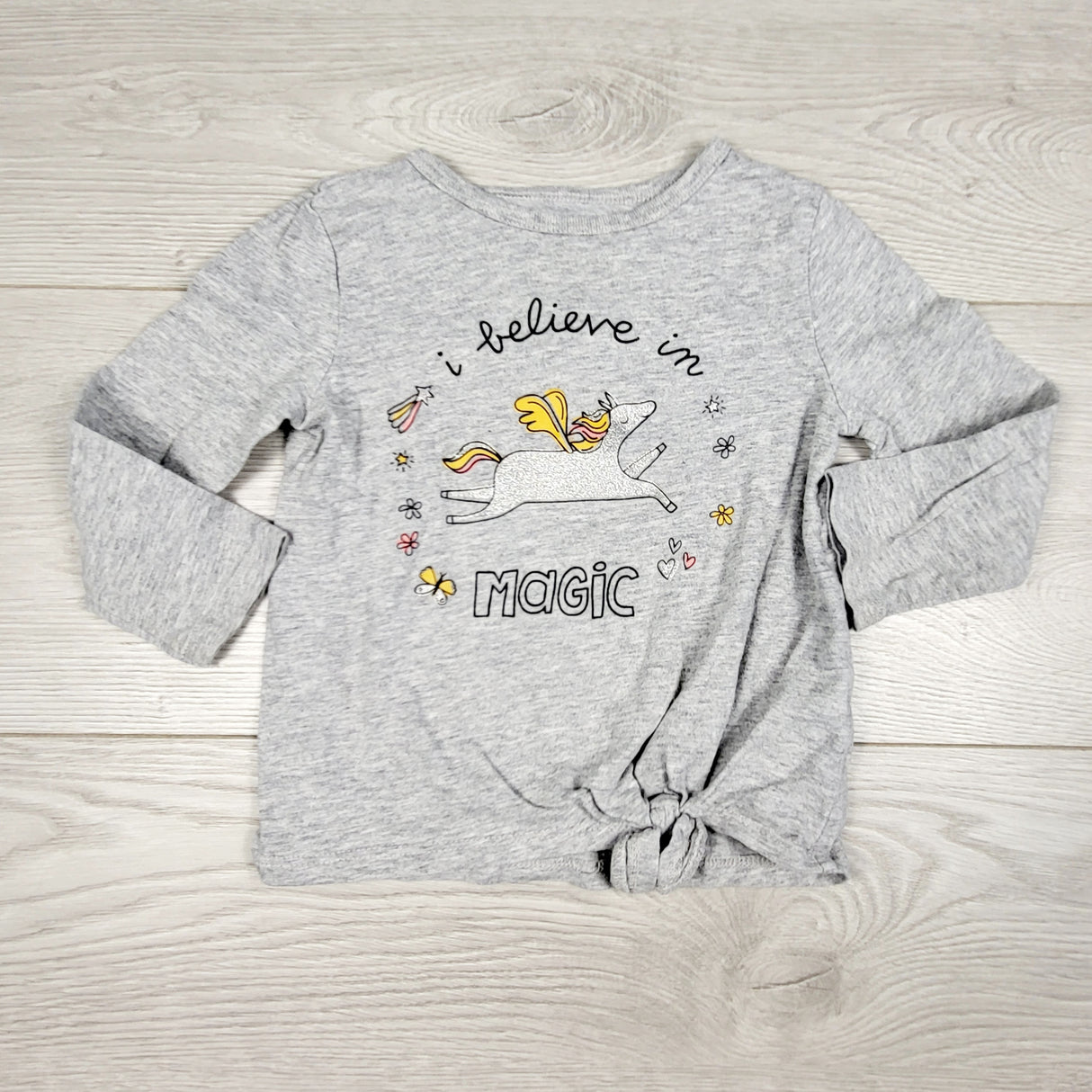 ECRS1 - Carters grey knotted "I Believe in Magic" top. Size 18 months
