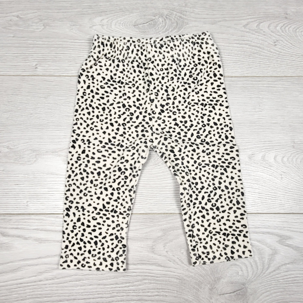 ECRS11 - Child of Mine leopard print leggings. Size 3-6 months