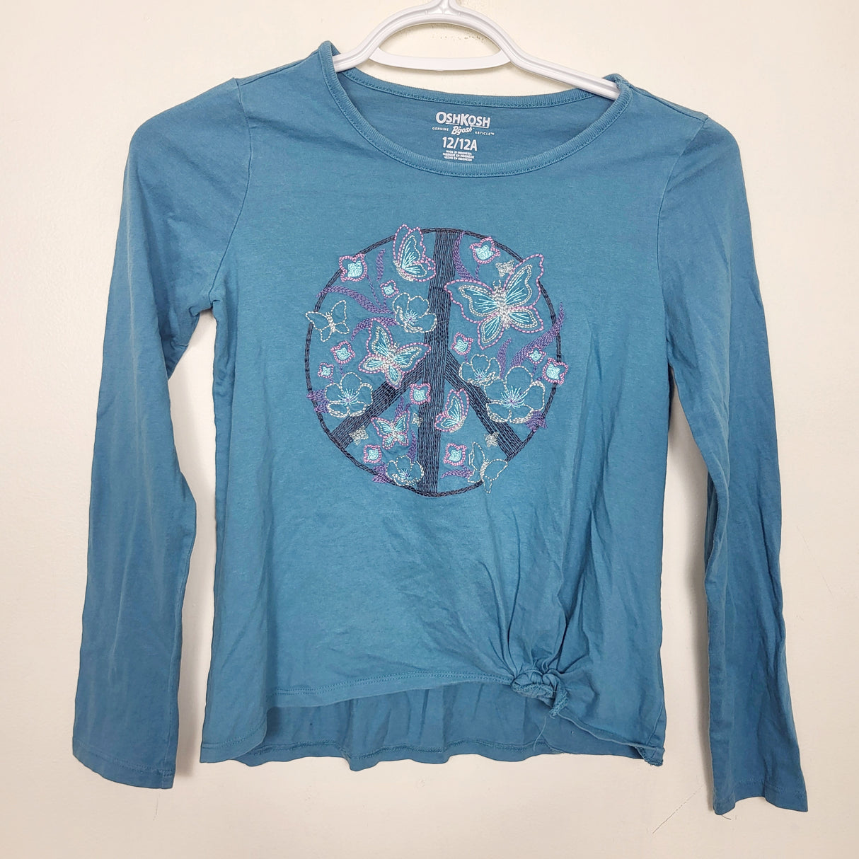 MAWA1 - Oshkosh teal long sleeved top with peace sign. Size 12