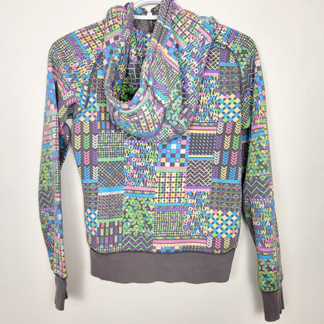 MAWA1 - TNA grey patterned zip up hoodie. ADULT size XS