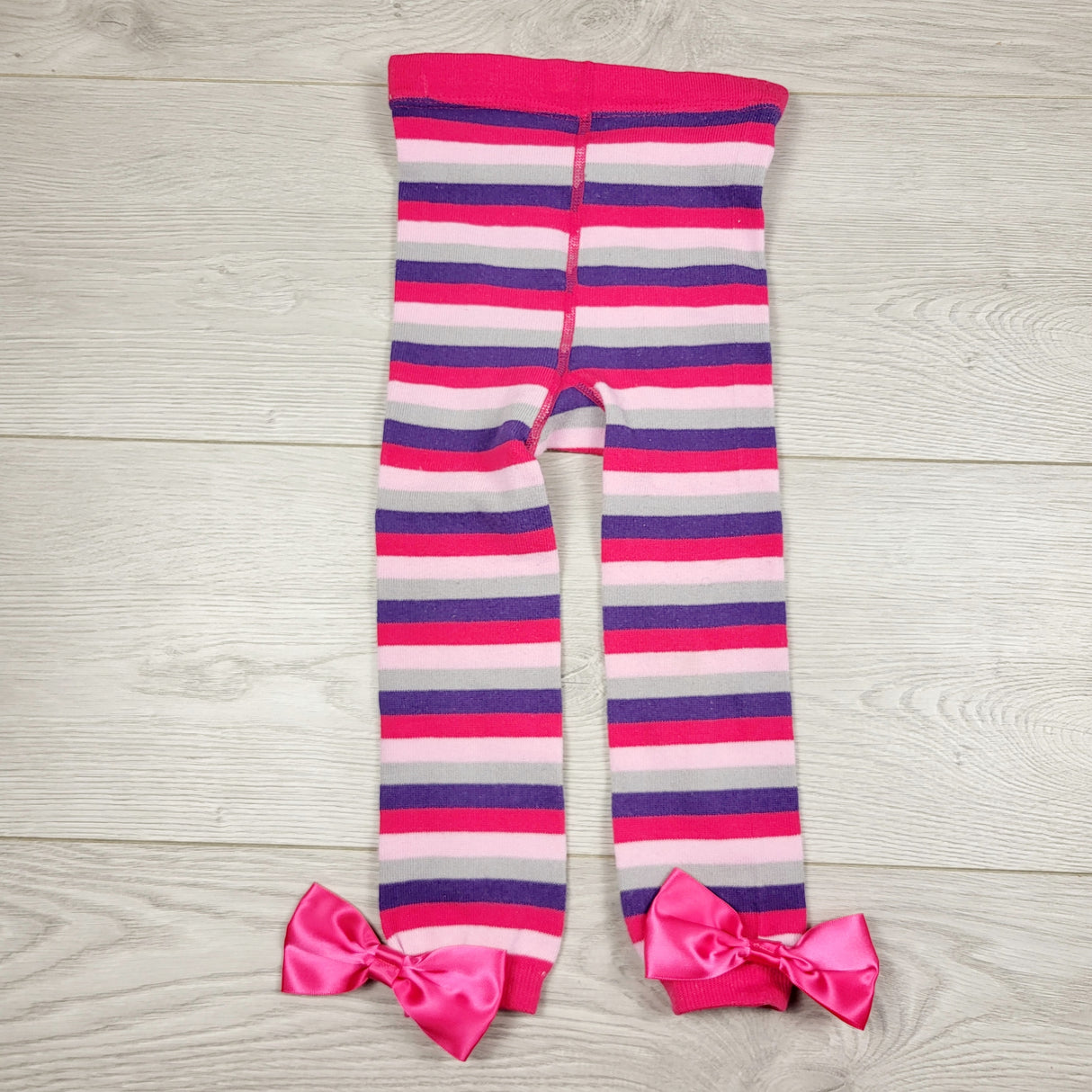MAWA1 - Striped tights with bows. Size 18 months