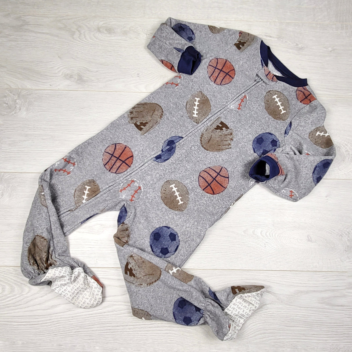JLSN1 - Carters grey zippered fleece sleeper with sports theme. Size 3T