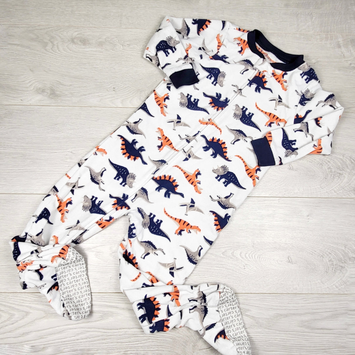 JLSN1 - Carters white zippered fleece sleeper with dinosaurs. Size 3T