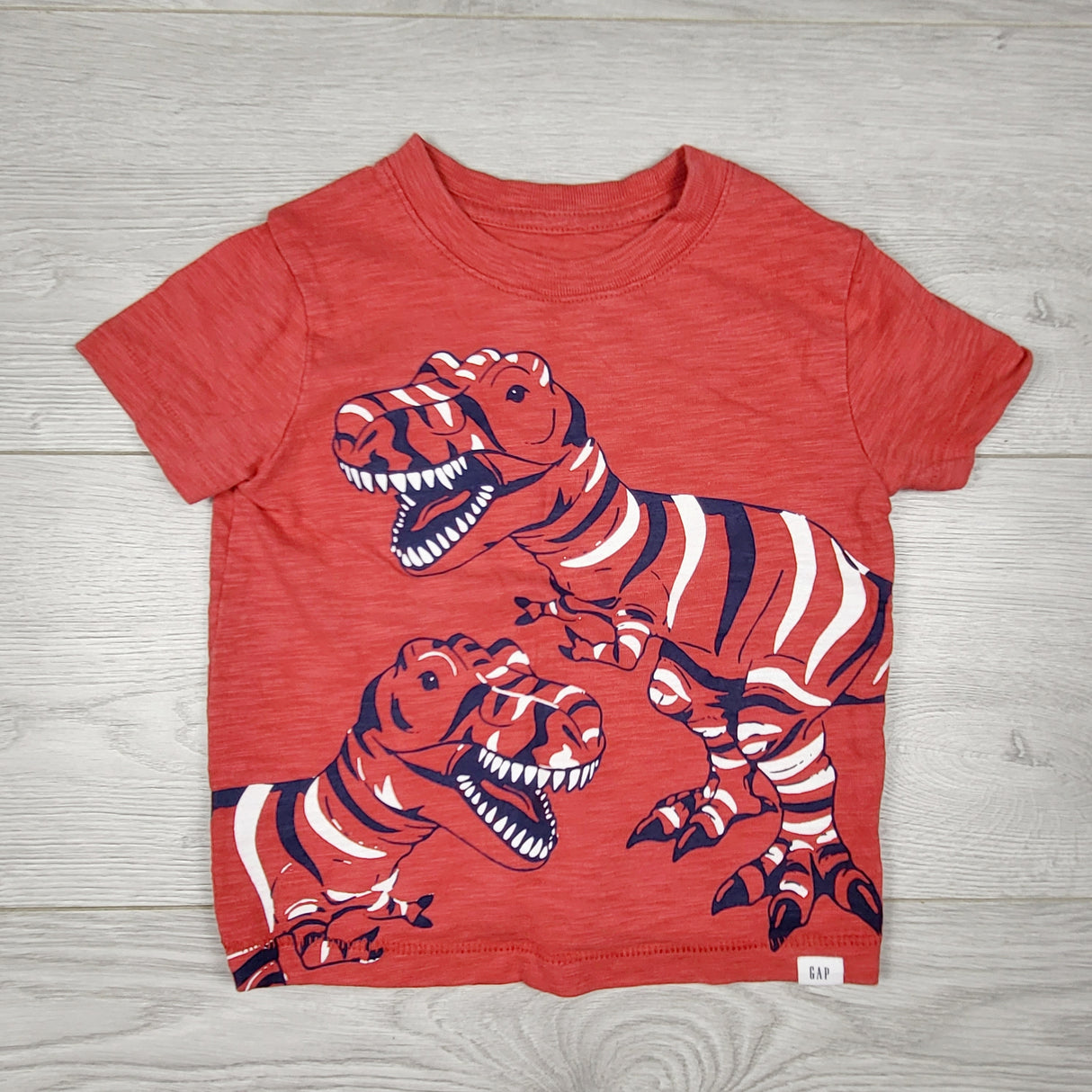 JLSN1 - Gap red t-shirt with dinosaurs. Size 18-24 months