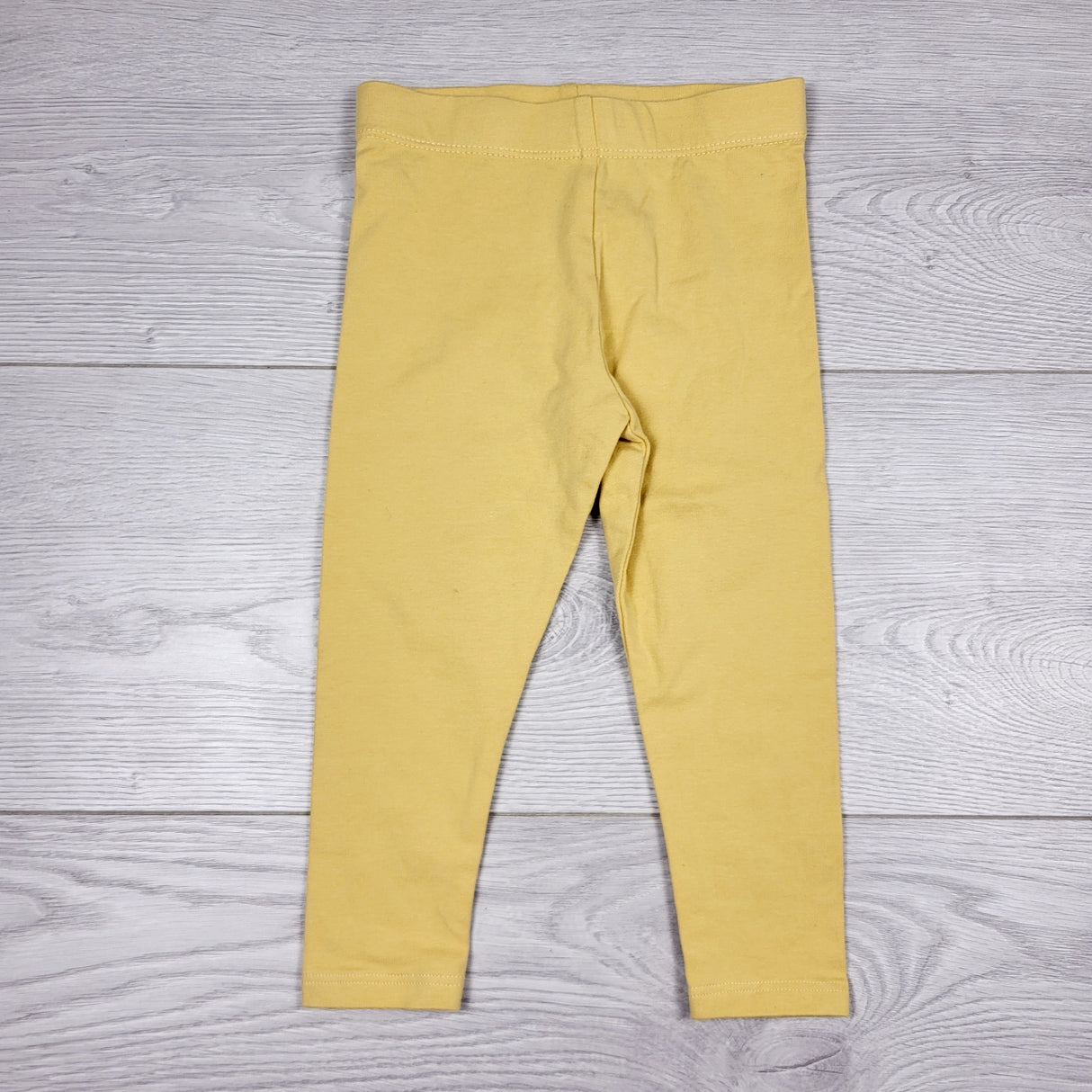 ECRS2 - Solid yellow leggings. Size 12 months