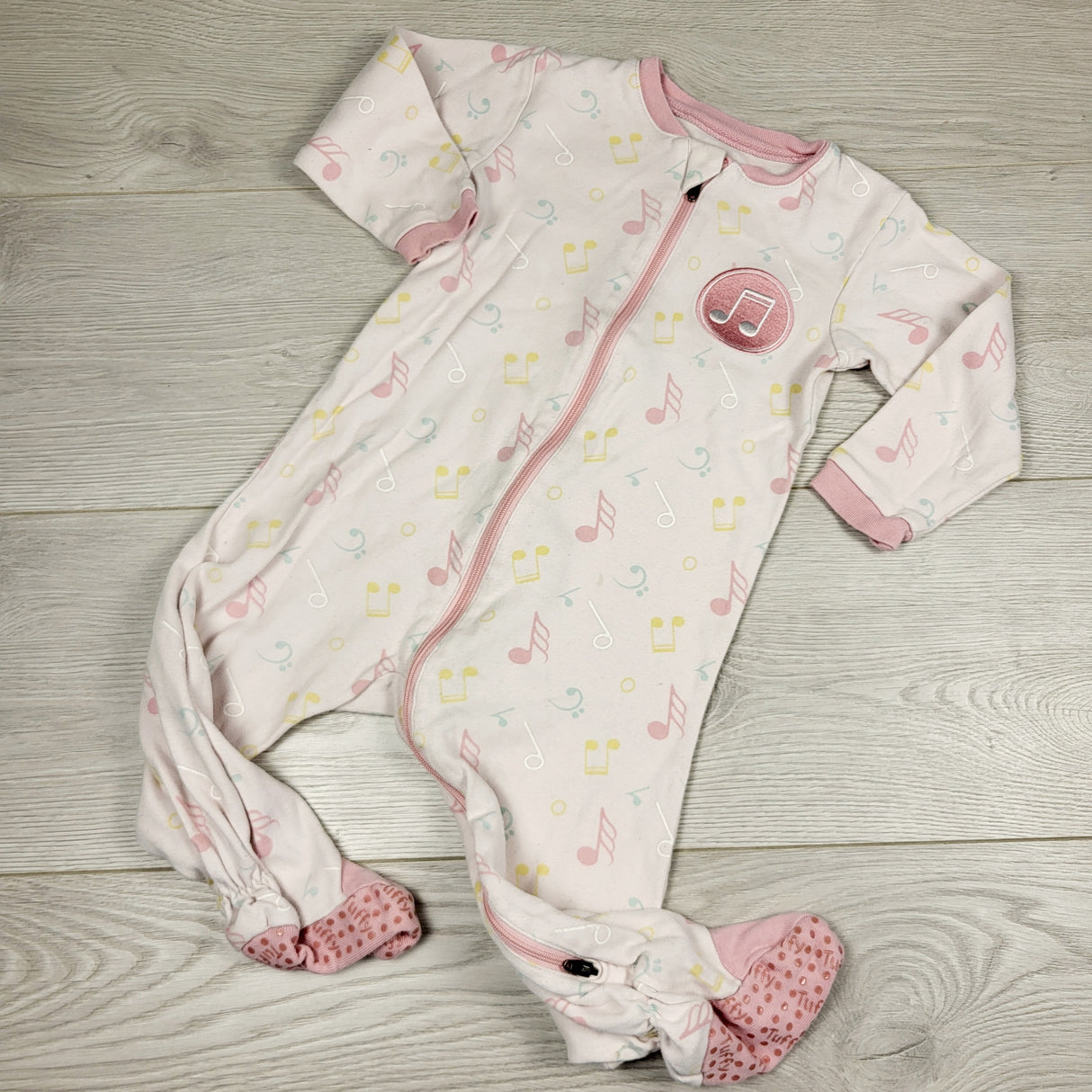 ECRS2 - Tuffy pink zippered sleeper with musical notes. Size 12 months