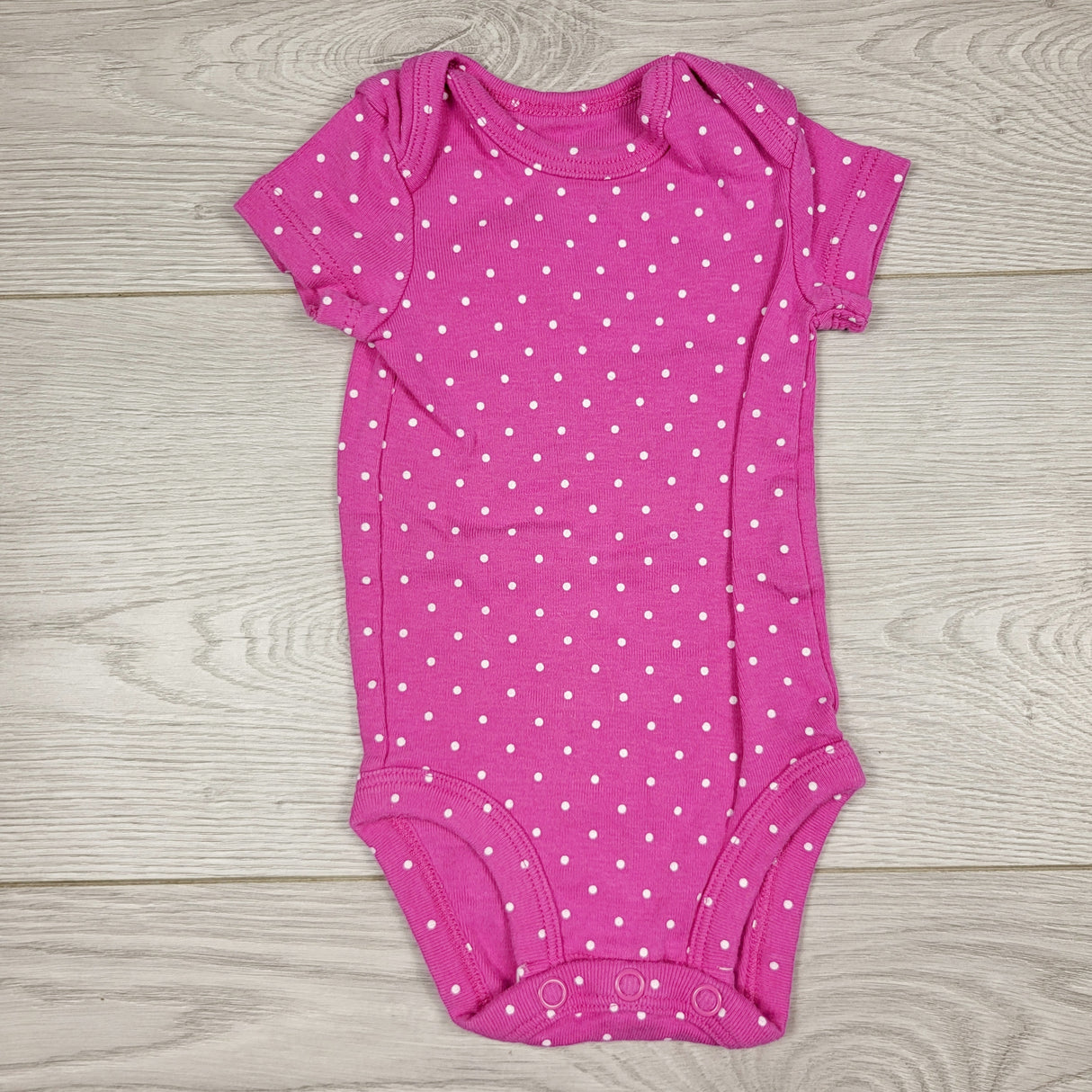 ECRS2 - Carters pink polka dot bodysuit. Newborn size