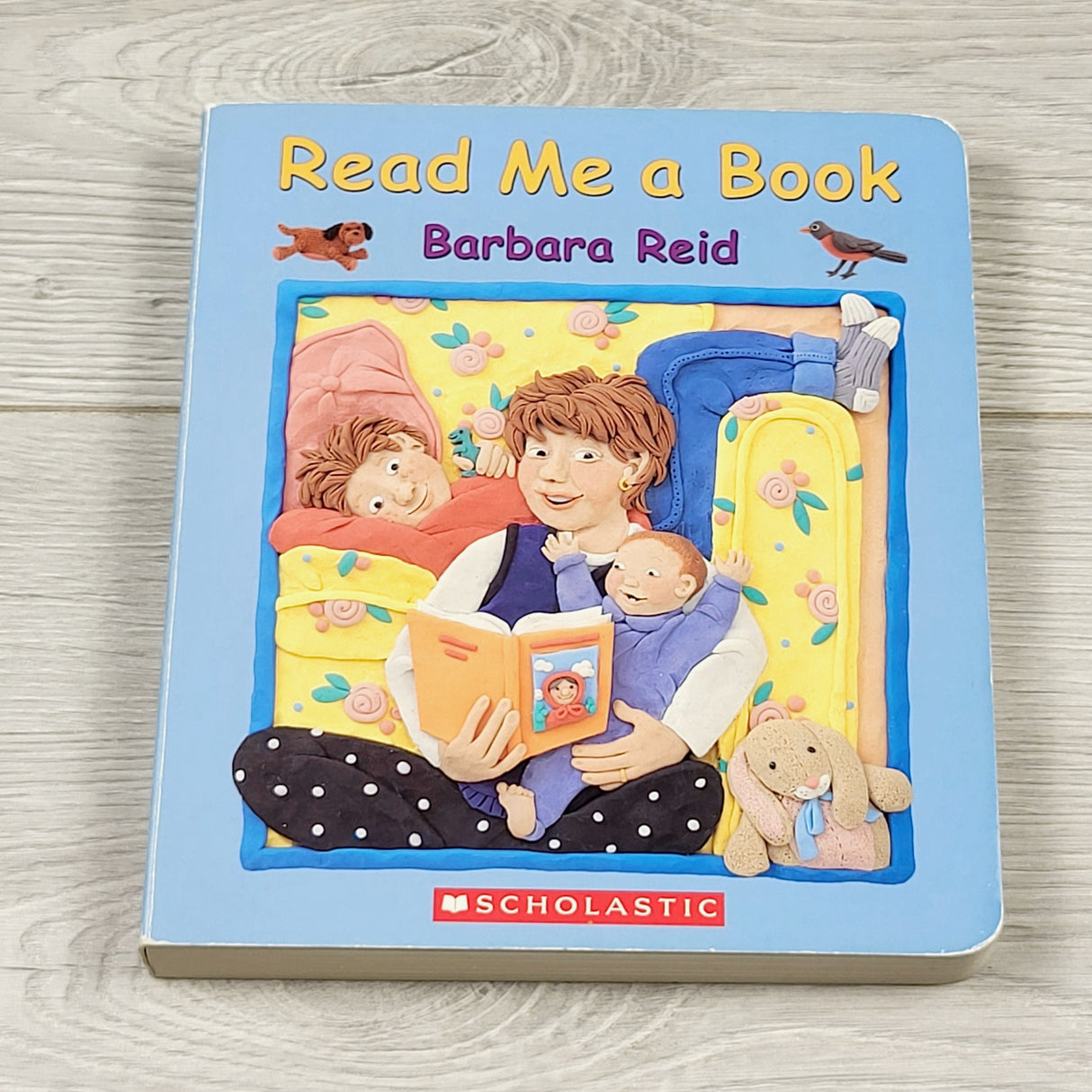 MIRE22 - Read Me a Book. Board book