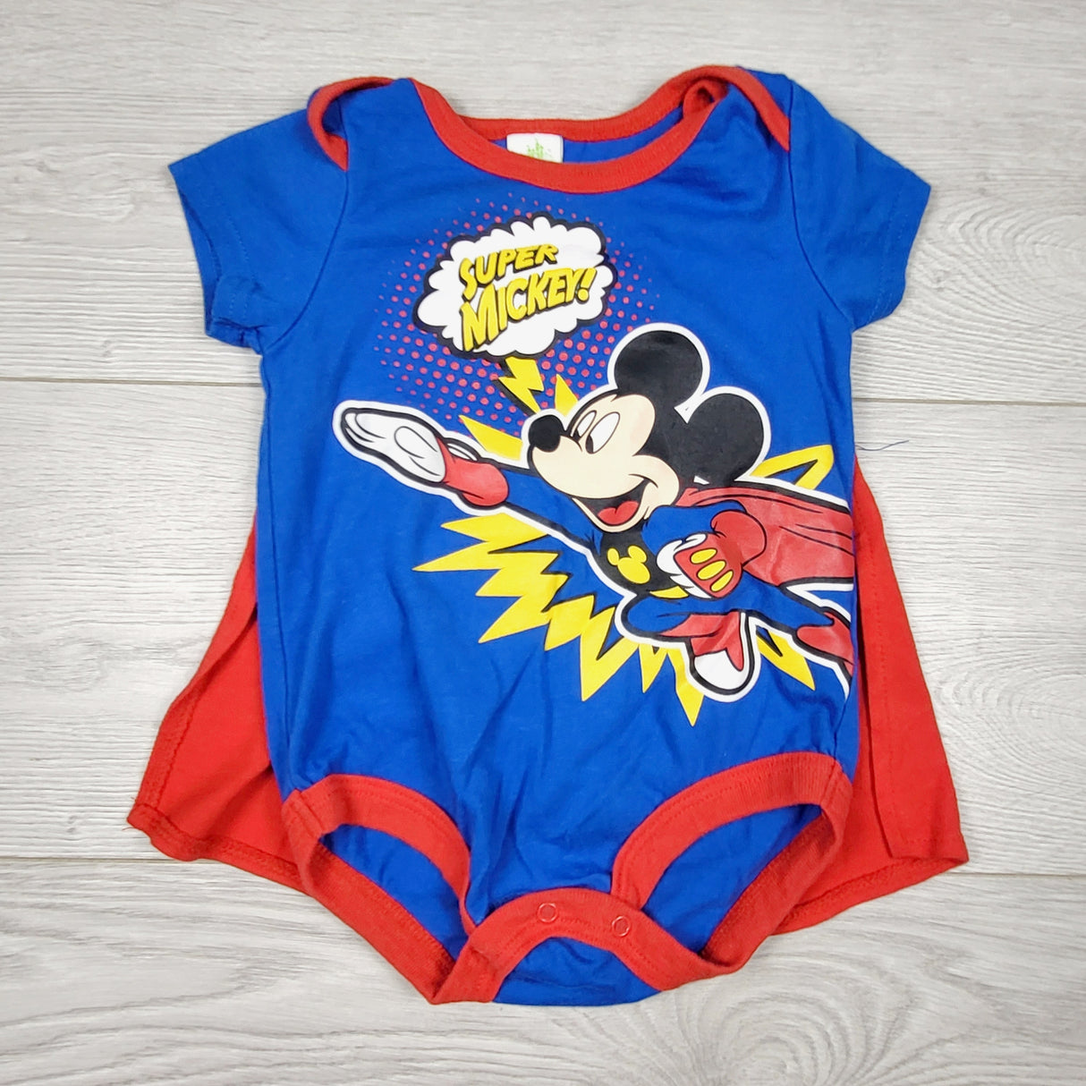 CHSP1 - Blue caped Mickey Mouse bodysuit. Size 6-12 months
