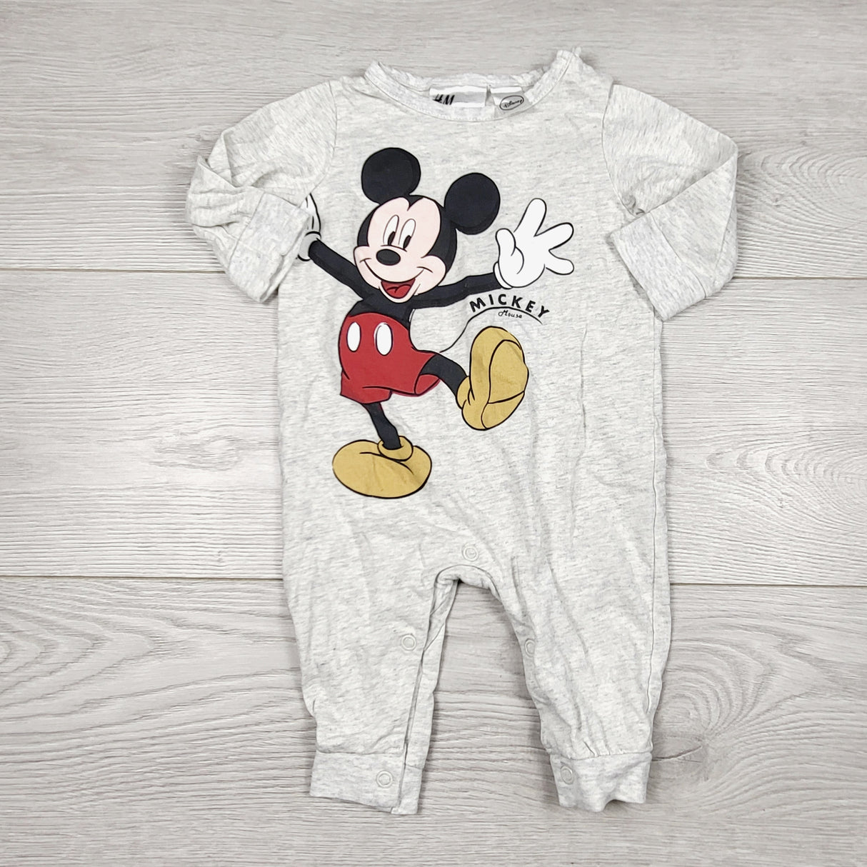 CHSP1 - H and M grey cotton Mickey Mouse sleeper. Size 1-2 months