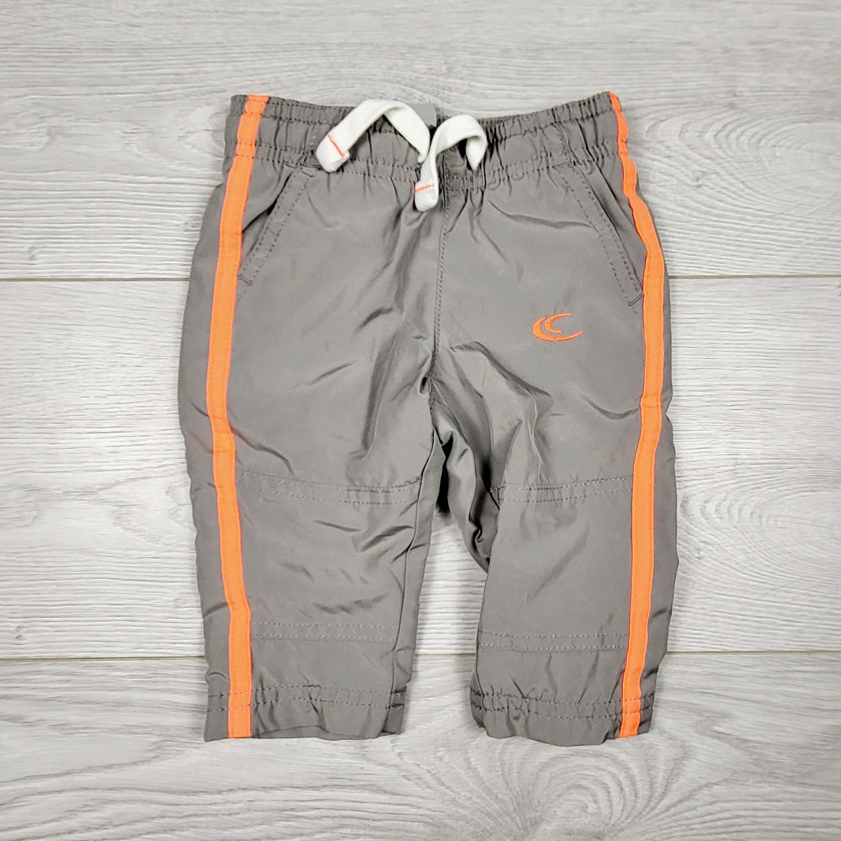 CHSP1 - Carters grey and orange jersey lined track pants. Size 3 months