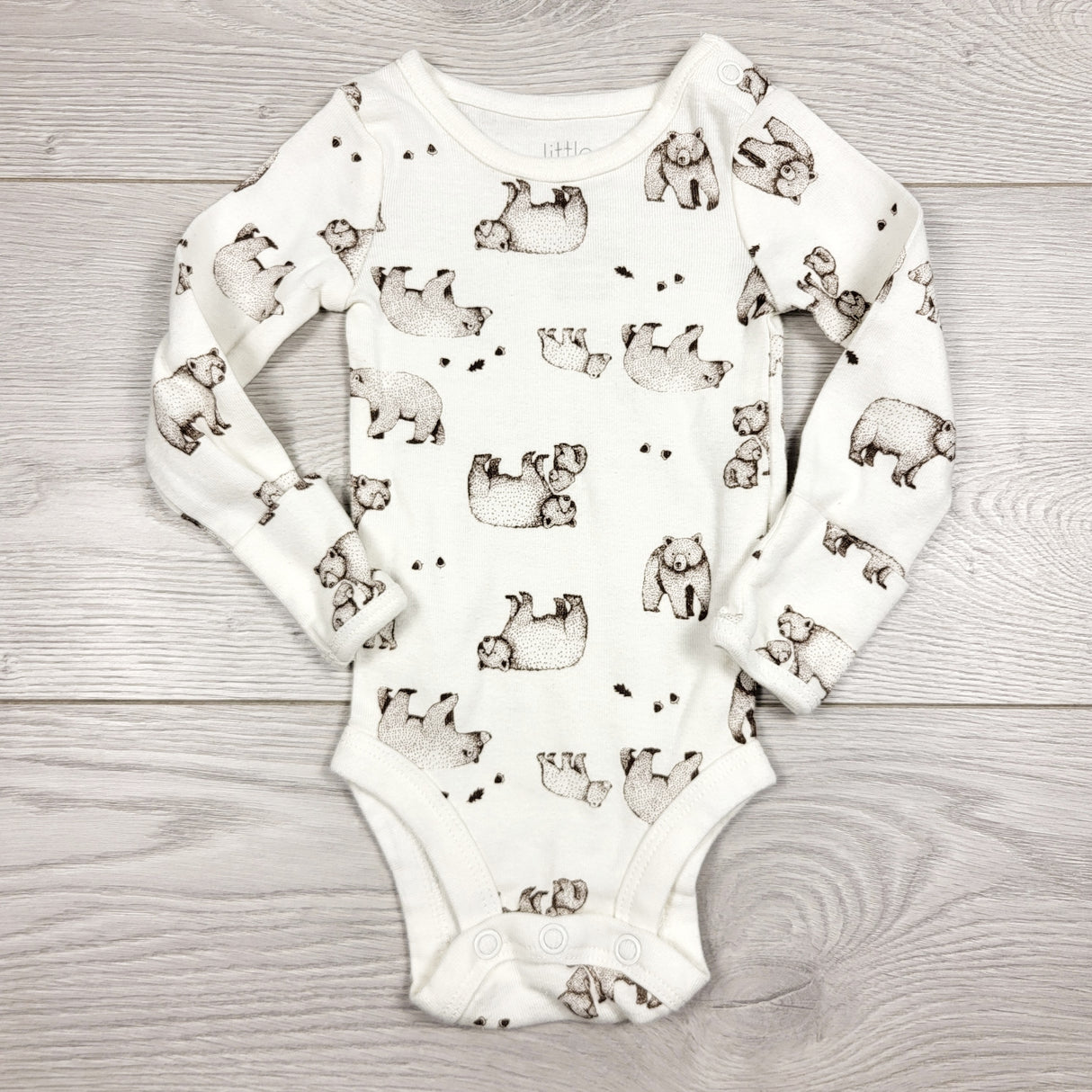 CCAM1 - Little Planet white long sleeved bear bodysuit. Newborn size