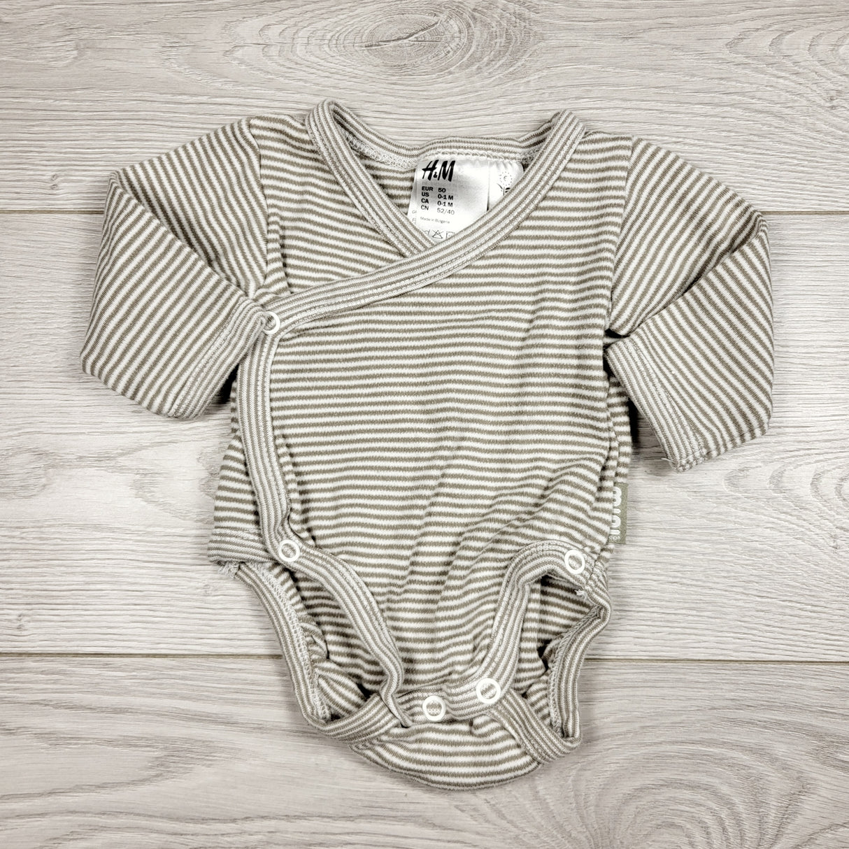 CCAM1 - H and M striped wrap style bodysuit. Newborn size