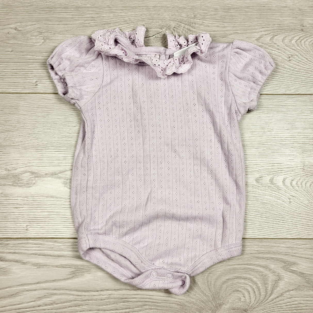 CCAM1 - Nicole Miller purple bodysuit with ruffle collar. Size 6-9 months