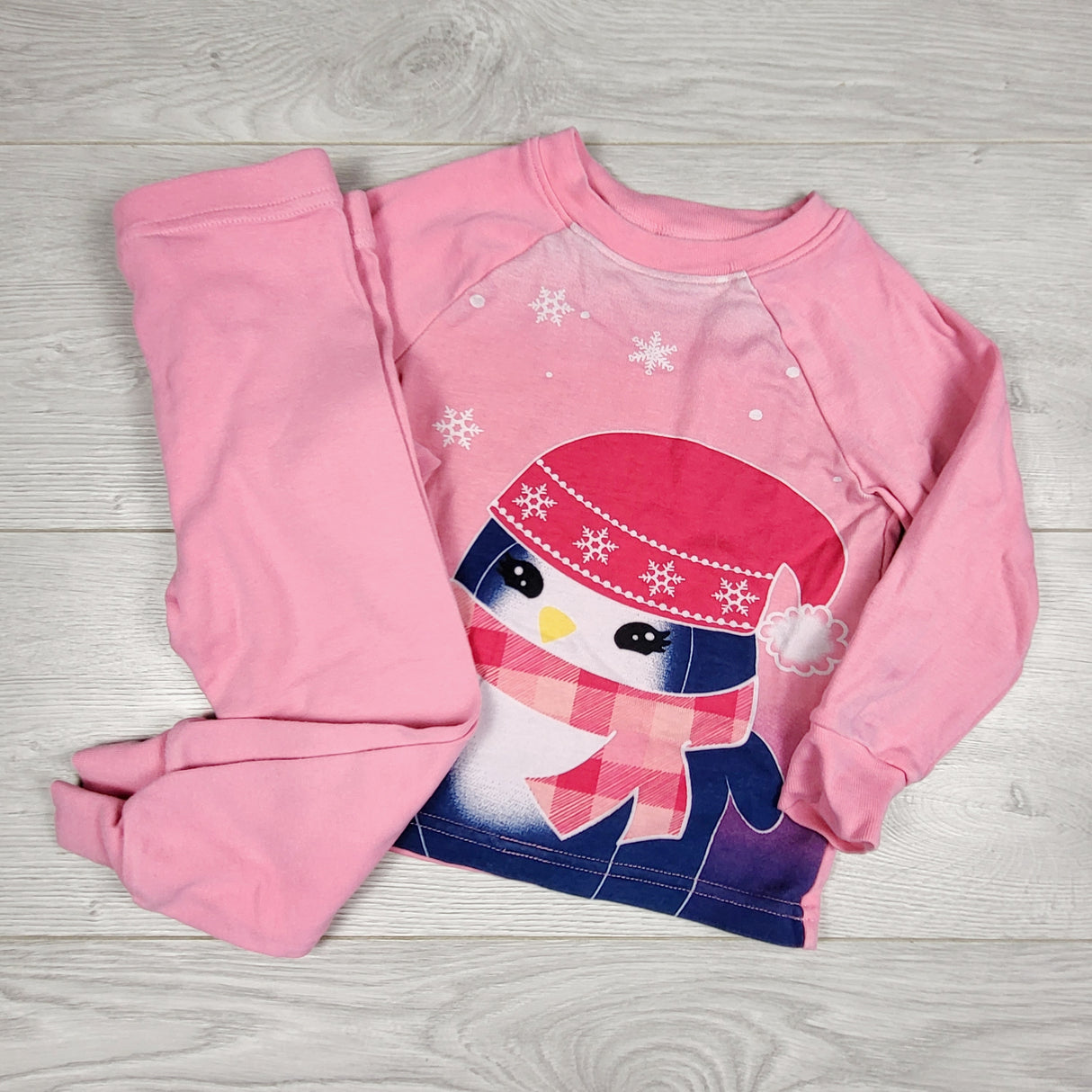CHSP2 - Kirkland pink 2pc PJs with penguin. Size 2T