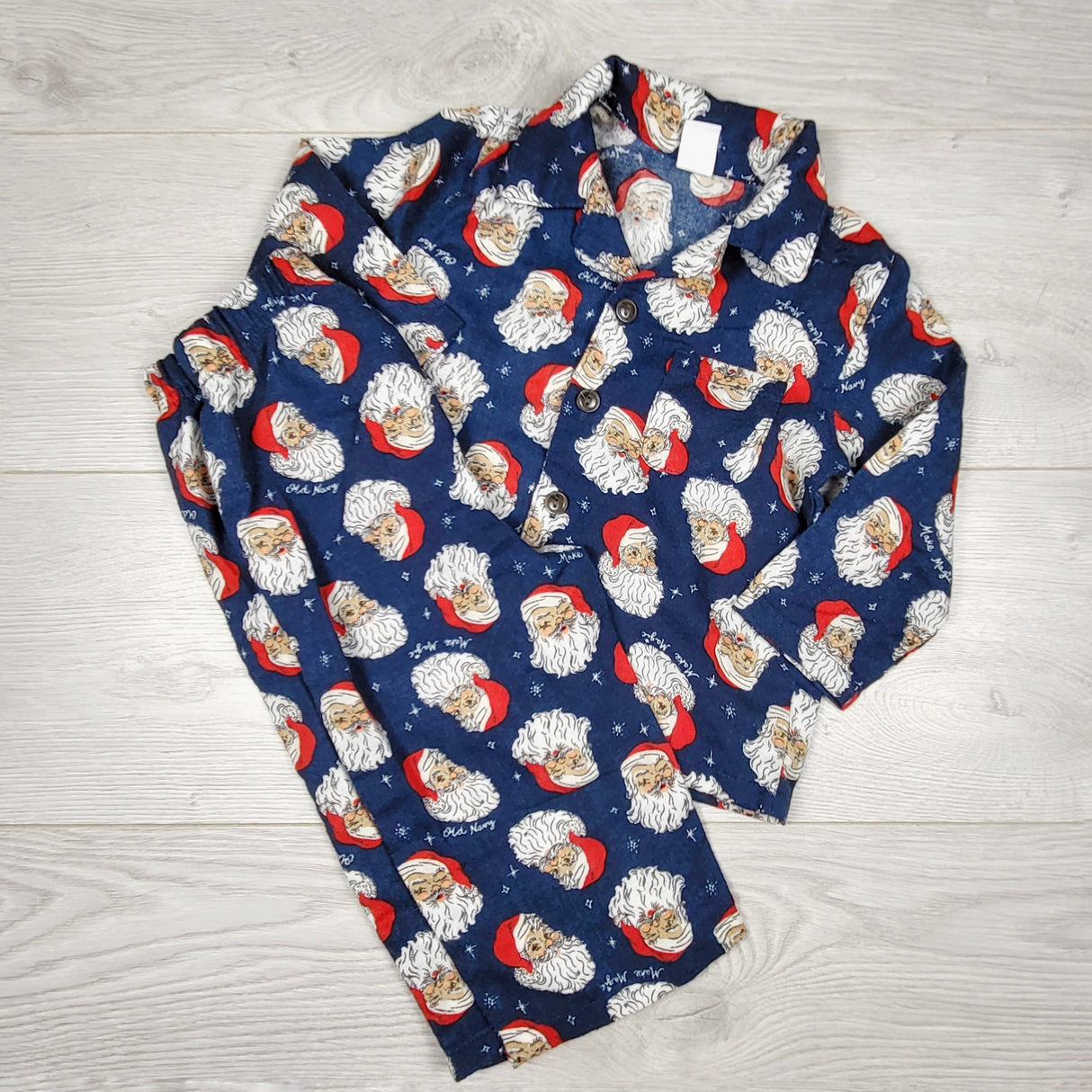 CBEN1 - Old Navy blue 2pc button down Santa PJs. Size 12-18 months