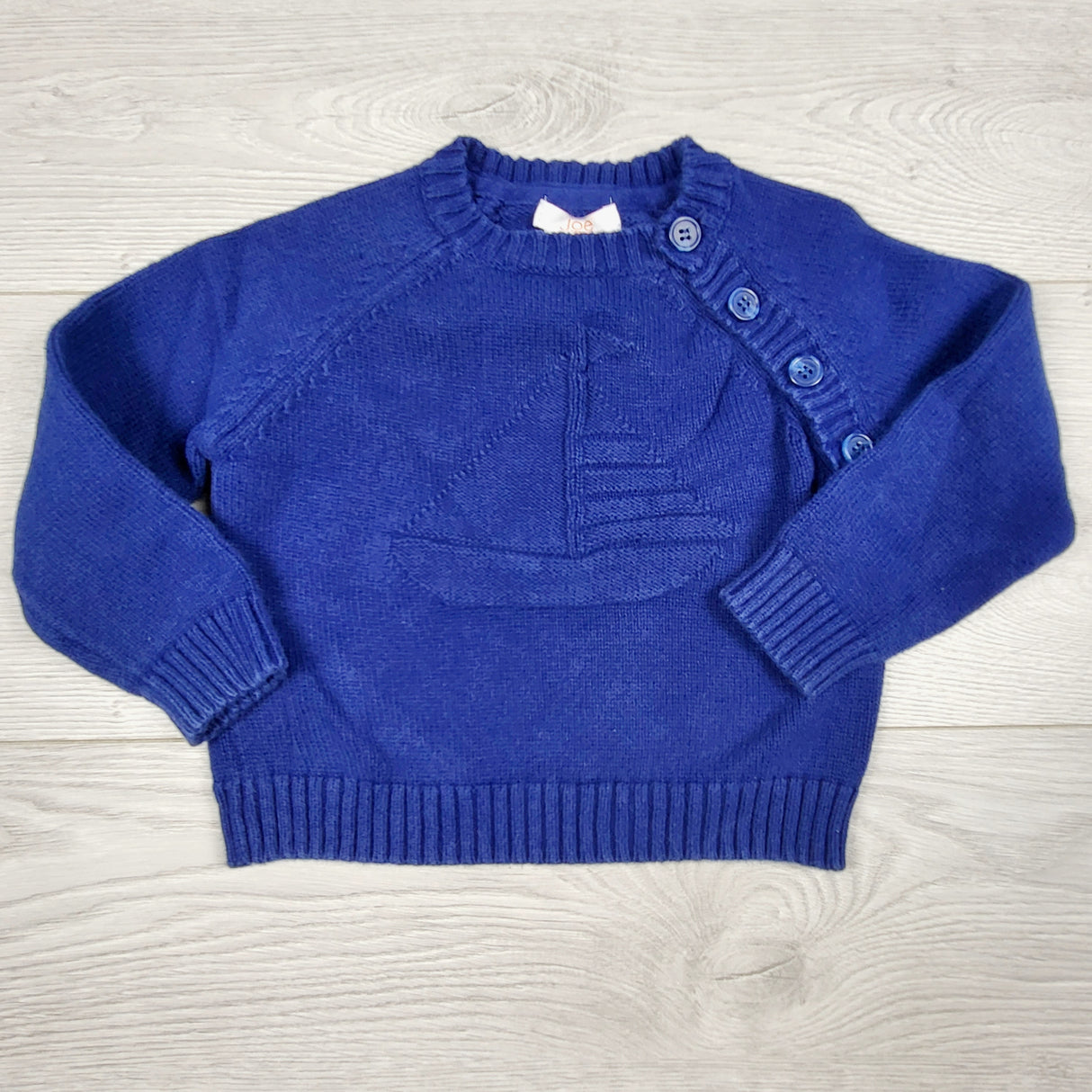 CBEN1 - Joe blue sweater with embossed sailboat. Size 12-18 months