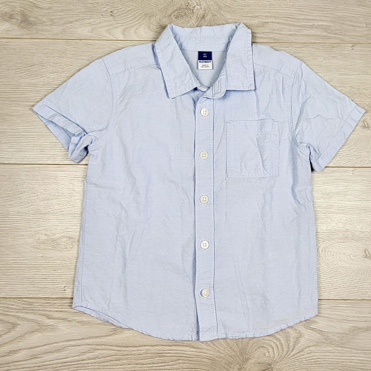 KMIL1 - Old Navy light blue button down shirt. Size 4T